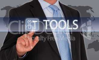 Tools - Businessman with touchscreen
