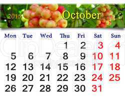 calendar for October of 2015 with branch of red ripe schisandra