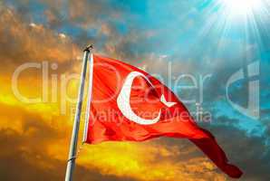 Flag of Turkey waving in the wind with highly detailed fabric te