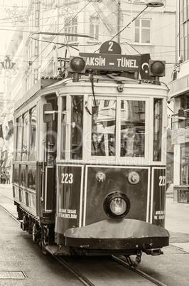 ISTANBUL, TURKEY - SEPTEMBER 21, 2014: The old tram and people w