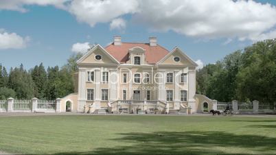 A horse carriage is arriving in the old manor from Estonia FS700 4K RAW Odyssey 7Q