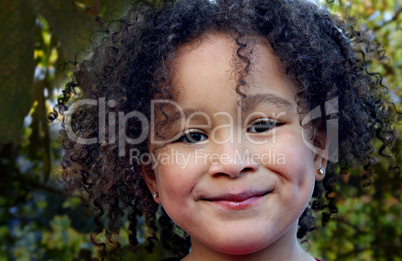 Young black girl with a beautiful smile
