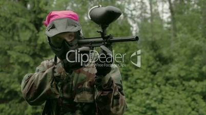 A man shooting seven times using the paintball 4K FS700 Odyssey 7Q