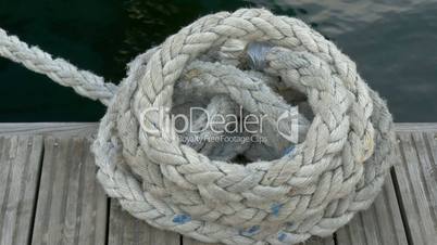 A big rope tied on the edge of the port in Estonia GH4 4K UHD