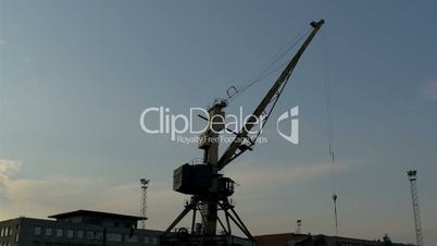 Big crane on standby on a dusky afternoon in the port GH4 4K