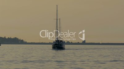 A small yacht on sail on the ocean water GH4 4K