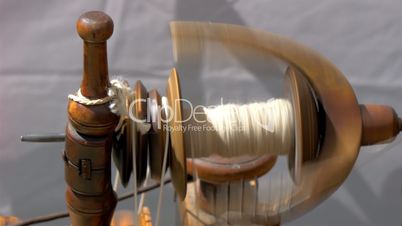 An old spinning wheel fastly turning around GH4 4K