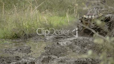 A 4x4 offroad vehicle splunging on the mud  FS700 4K