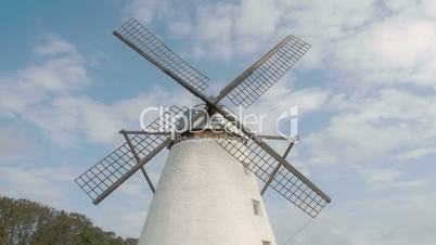The old windmill with four blades in the farm FS700 4K