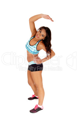 Exercising girl stretching.