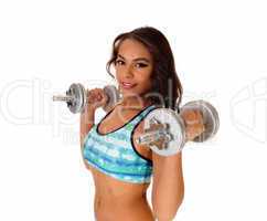 Pretty woman lifting dumbbell's.