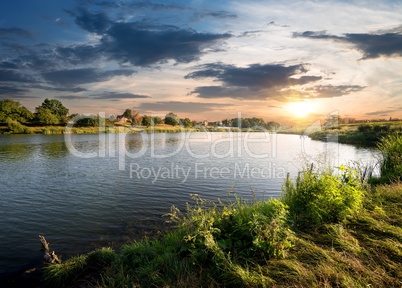 Blue river under clouds