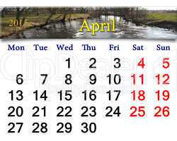 calendar for April of 2015 year with image of flood