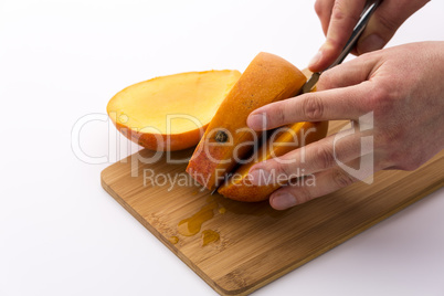 Second Cut Through A Mango Does Yield Three Slices