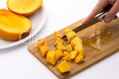 Ripe Mango Fruit Pulp Diced With A Kitchen Knife