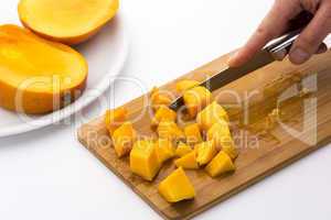 Ripe Mango Fruit Pulp Diced With A Kitchen Knife
