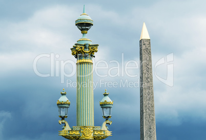 Obelisk in Place de la Concorde against cloudy sky - Paris