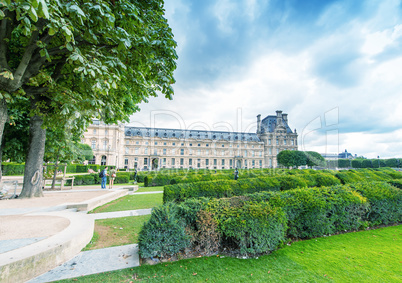 PARIS - JUNE 15, 2014: Tourists in Tuileries Gardens on a summer