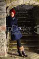 Redhead girl on stone stairways