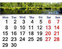 calendar for June of 2015 year with image of forest lake