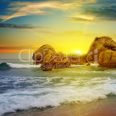 sea landscape with rocky island and the sunrise