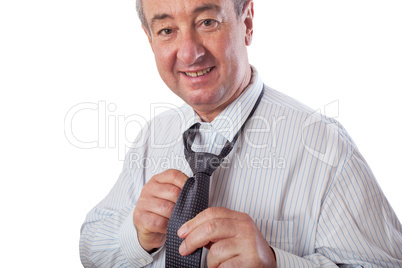 Businessman binds the tie