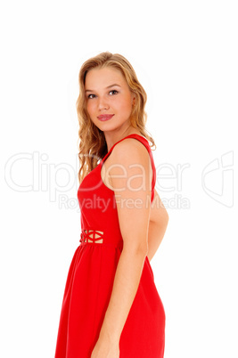 Woman standing in profile.