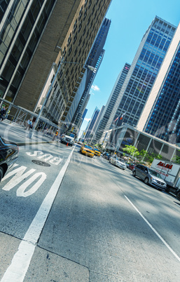 NEW YORK - MAY 11: Taxicabs along Manhattan avenues. Licensed by