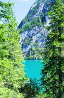 Wonderful green colors of Braies lake - Mountain landscape in It