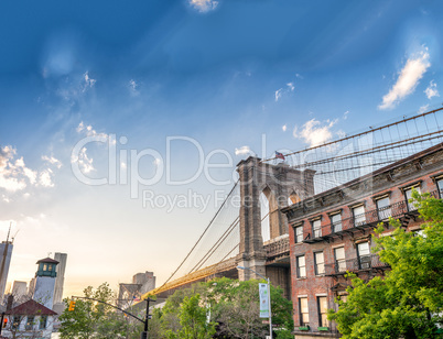 Brooklyn Bridge as seen from Brooklyn streets at sunset time