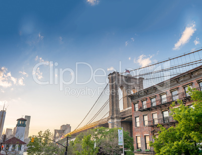 Brooklyn Bridge as seen from Brooklyn streets at sunset time