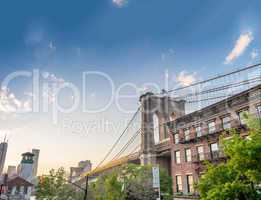 Brooklyn Bridge as seen from Brooklyn streets at sunset time