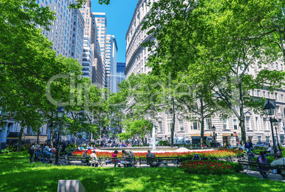 NEW YORK CITY - MAY 14, 2013: Tourists relax on a city park. Mor