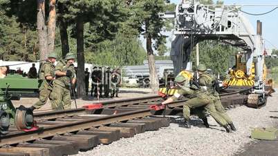 Soldiers are connecting railroads.