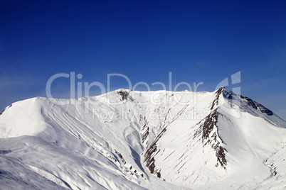 Snowy mountains in wind day