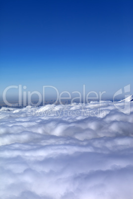 Mountains under clouds in nice winter morning