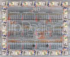 calendar for 2015 year in the dollars' frame on the wooden board