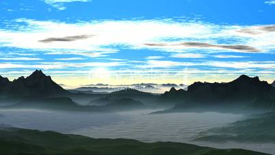 Sunrise over the misty hills