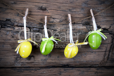 Four Green And Yellow Easter Eggs With Frame