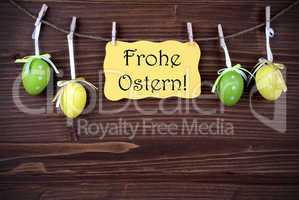 Yellow Label With Four Easter Eggs And Frohe Ostern