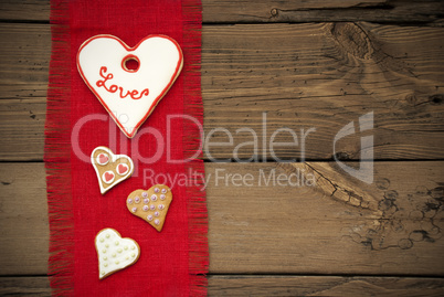 Red Fabric Texture With Heart Cookies