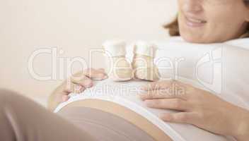 Pregnant woman with booties