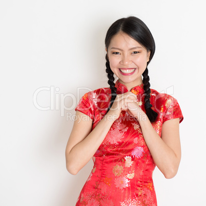 Asian chinese girl congratulating