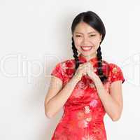 Asian chinese girl congratulating