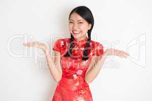 Asian chinese girl showing palm