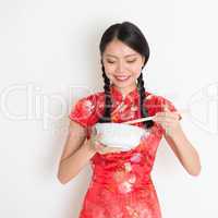 Asian chinese girl eating something