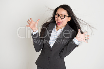 Surprised young Asian business woman