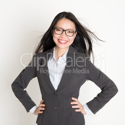 Confident young Asian business woman