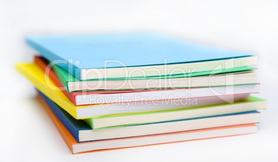 Stack of vivid ledgers