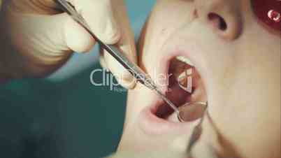 Dentist providing examination of a woman